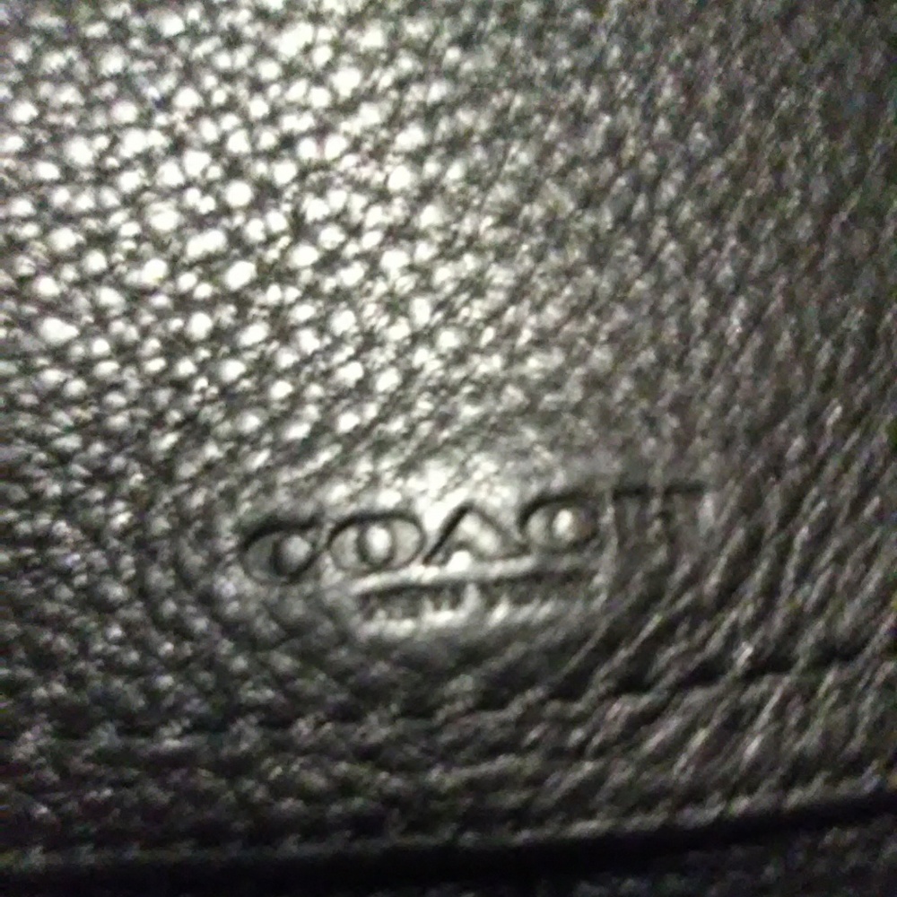Black Coach wristlet.